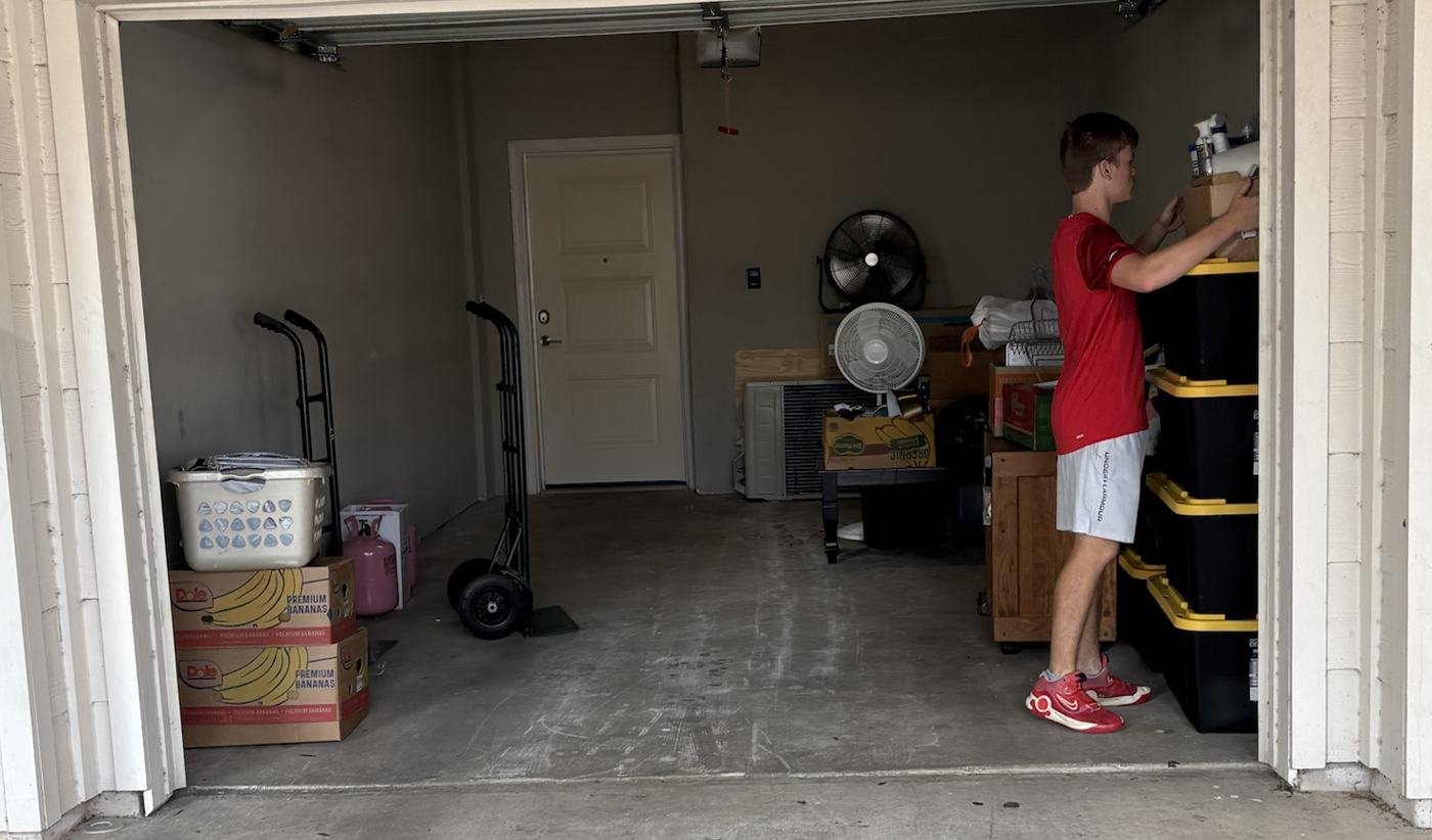 BlackJack Haul Off & Moving: Garage cleanout with crew loading totes